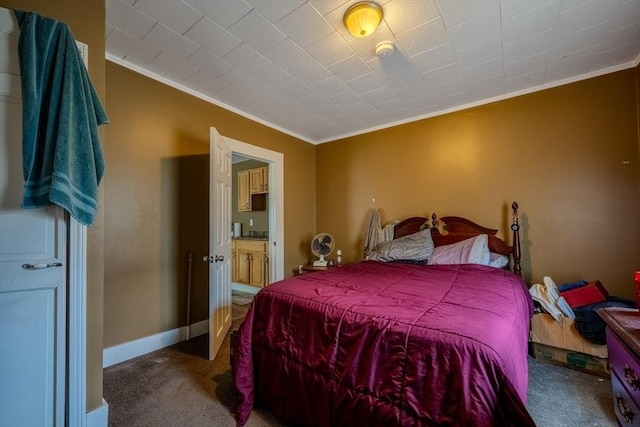 carpeted bedroom featuring ornamental molding