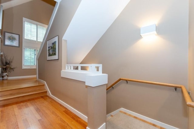 1175 Chestnut St Unit 33, Newton, MA 02464 - staircase featuring wood finished floors and baseboards