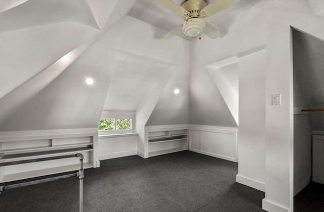 409-411 Atlantic Ave Unit 409, Marblehead, MA 01945 - bonus room with dark carpet, lofted ceiling, ceiling fan, and a wainscoted wall