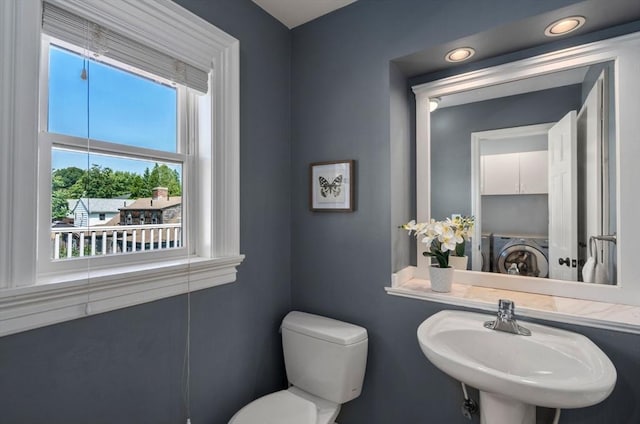 409-411 Atlantic Ave Unit 409, Marblehead, MA 01945 - bathroom featuring washer / dryer and recessed lighting