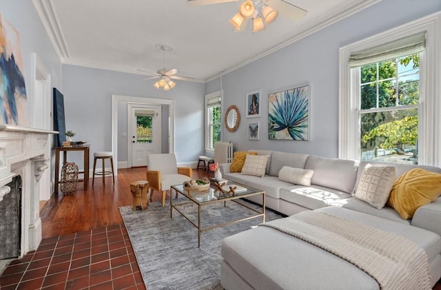409-411 Atlantic Ave Unit 409, Marblehead, MA 01945 - living room featuring a ceiling fan, ornamental molding, a fireplace, and radiator