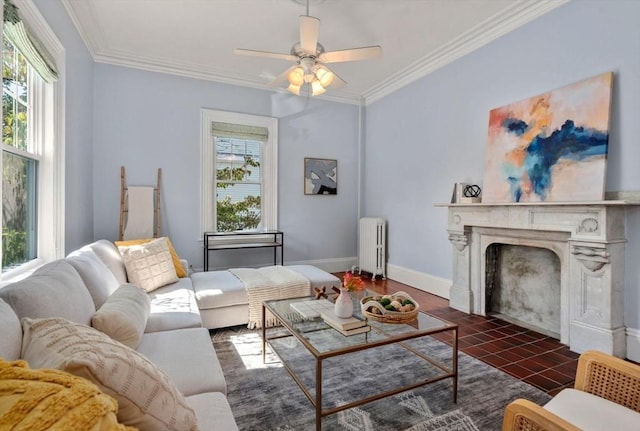 409-411 Atlantic Ave Unit 409, Marblehead, MA 01945 - living area with radiator, healthy amount of natural light, a high end fireplace, crown molding, and a ceiling fan