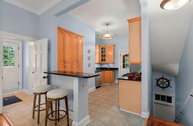 409-411 Atlantic Ave Unit 409, Marblehead, MA 01945 - kitchen with dark countertops, a breakfast bar, stainless steel dishwasher, glass insert cabinets, and pendant lighting