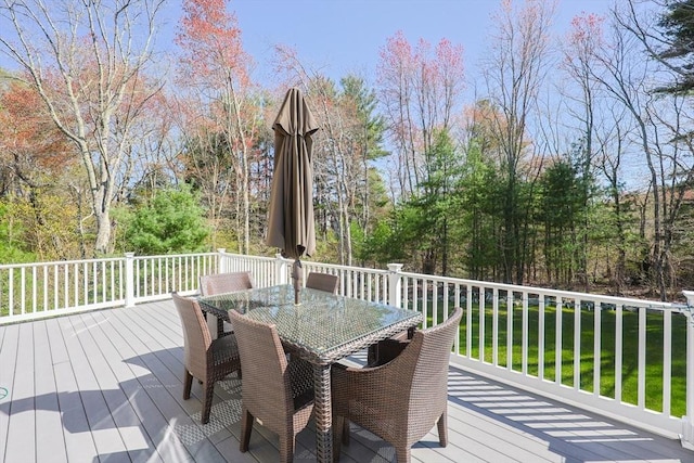 deck featuring outdoor dining area