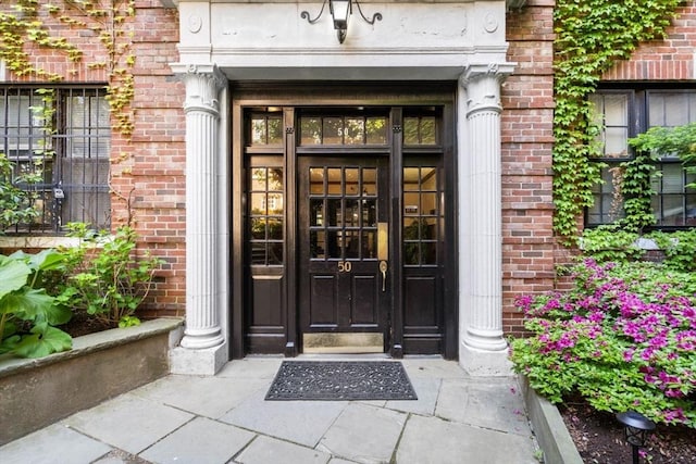 50 Follen St Unit 306, Cambridge, MA 02138 - view of exterior entry featuring brick siding