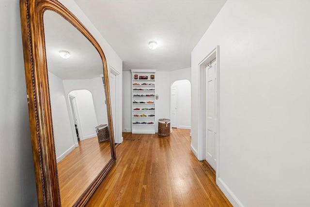 50 Follen St Unit 306, Cambridge, MA 02138 - corridor with arched walkways and light wood-type flooring