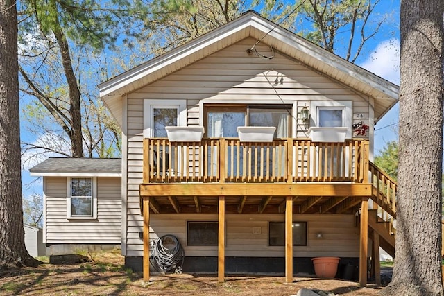 36 Elm Rd, Westford, MA 01886 - back of property with a deck