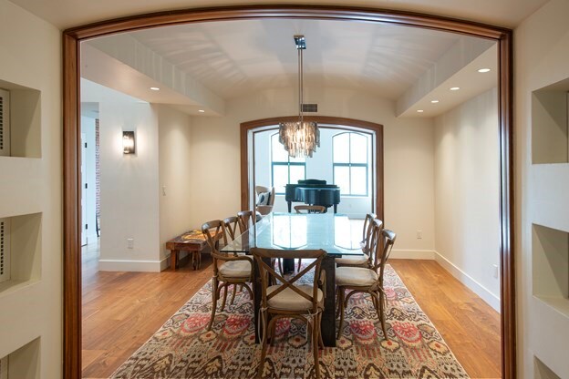 261-263 Main St, Northampton, MA 01060 - dining room with wood-type flooring and a notable chandelier