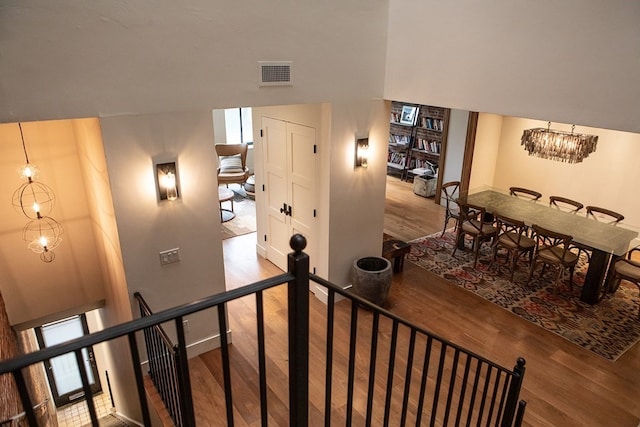 261-263 Main St, Northampton, MA 01060 - stairs with a chandelier and hardwood / wood-style floors