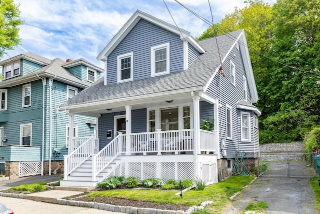 221 Eastern Ave, Lynn, MA 01902 - view of front facade featuring a porch and roof with shingles