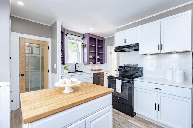 221 Eastern Ave, Lynn, MA 01902 - kitchen with black / electric stove, under cabinet range hood, dishwasher, a sink, and white cabinetry
