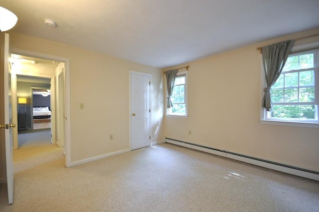 3 Cornet Stetson, Rockland, MA 02370 - unfurnished bedroom with baseboard heating, carpet floors, multiple windows, and baseboards