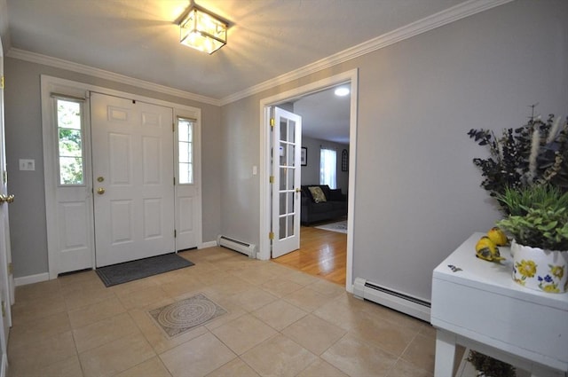 3 Cornet Stetson, Rockland, MA 02370 - entryway with baseboard heating, light tile patterned flooring, ornamental molding, and baseboards