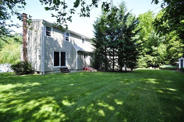 3 Cornet Stetson, Rockland, MA 02370 - rear view of house featuring a chimney and entry steps
