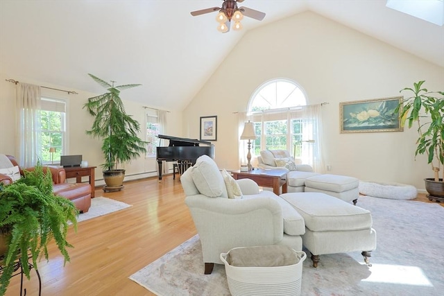 2 David Henry Gardner Ln, Southborough, MA 01772 - living room featuring wood finished floors, high vaulted ceiling, plenty of natural light, and ceiling fan
