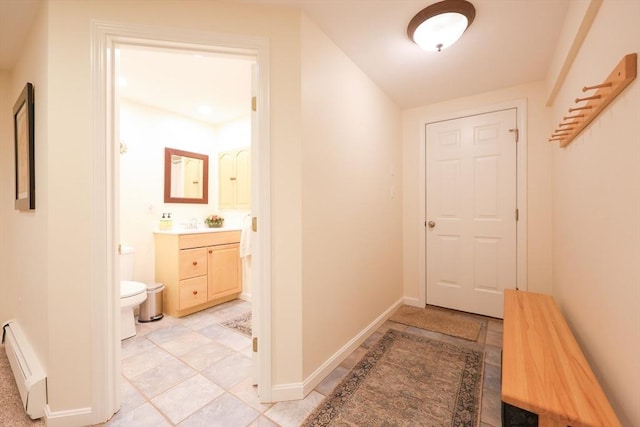 2 David Henry Gardner Ln, Southborough, MA 01772 - corridor with baseboard heating and baseboards