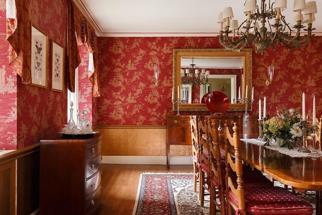 172 Beacon St Unit 4, Boston, MA 02116 - dining area featuring a chandelier, wood finished floors, and wallpapered walls