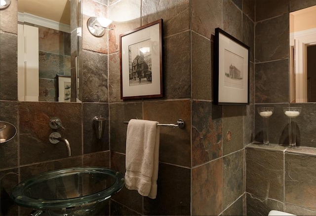 172 Beacon St Unit 4, Boston, MA 02116 - bathroom with a sink, ornamental molding, and tile walls
