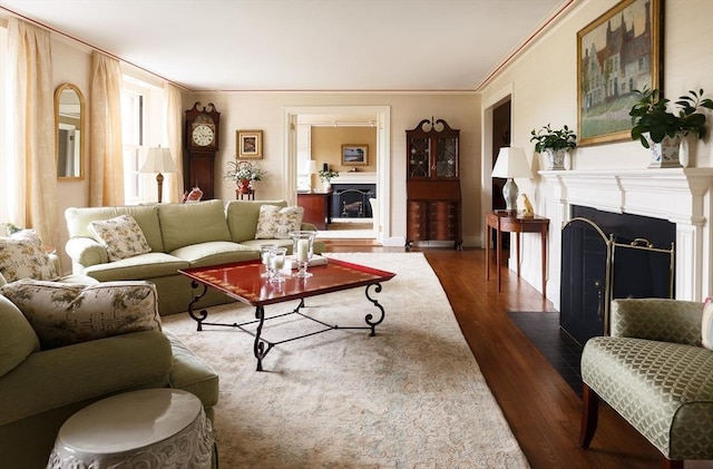 172 Beacon St Unit 4, Boston, MA 02116 - living room with a fireplace with flush hearth, wood finished floors, and crown molding