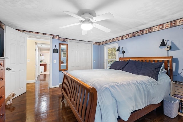 bedroom with ceiling fan, a closet, and dark hardwood / wood-style floors