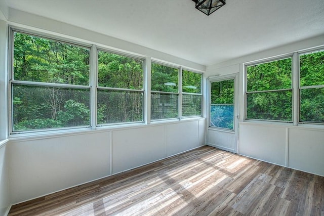 143 Ryan Rd, Stoughton, MA 02072 - unfurnished sunroom featuring healthy amount of natural light and wood finished floors