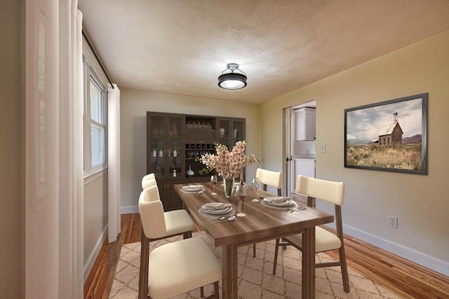 143 Ryan Rd, Stoughton, MA 02072 - dining space featuring light wood-style floors and baseboards