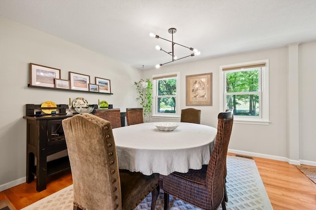965 Main St, Wilbraham, MA 01095 - dining space with a chandelier and wood finished floors
