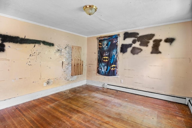 11 Williams St, Dudley, MA 01571 - empty room featuring ornamental molding, wood finished floors, baseboard heating, and baseboards