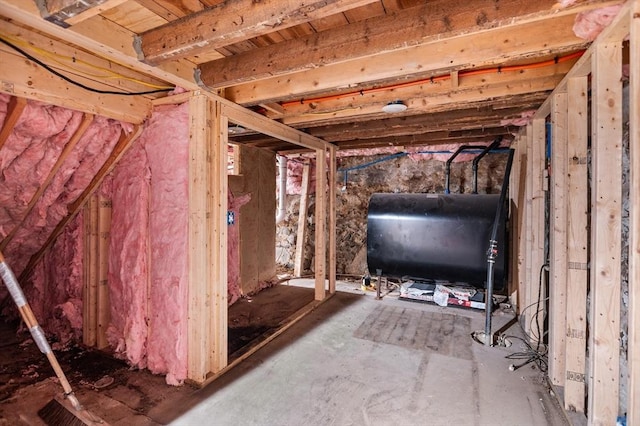 11 Williams St, Dudley, MA 01571 - unfinished below grade area featuring oil tank