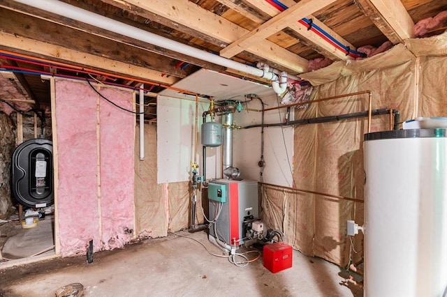 11 Williams St, Dudley, MA 01571 - utility room with water heater and a heating unit