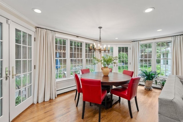 117 Deer Path Ln, Weston, MA 02493 - dining area with french doors, a chandelier, baseboard heating, healthy amount of natural light, and ornamental molding