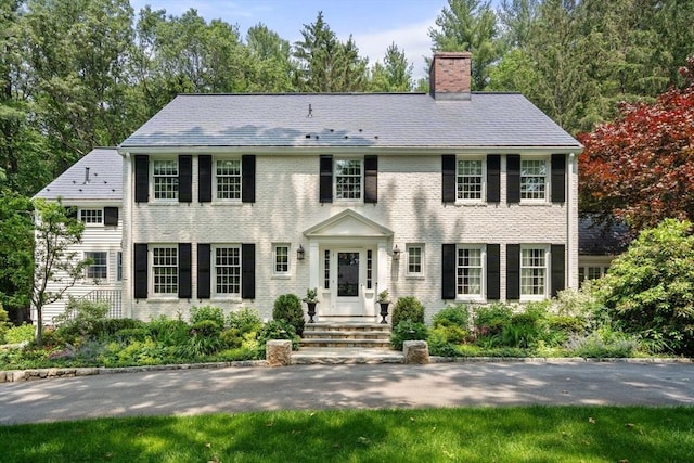 117 Deer Path Ln, Weston, MA 02493 - colonial-style house featuring a chimney