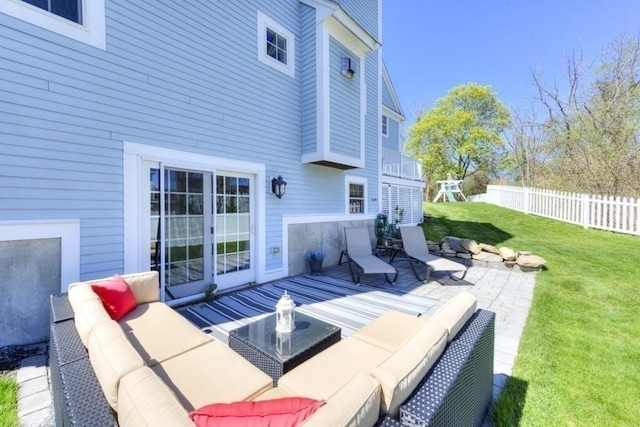 view of patio with fence and an outdoor hangout area