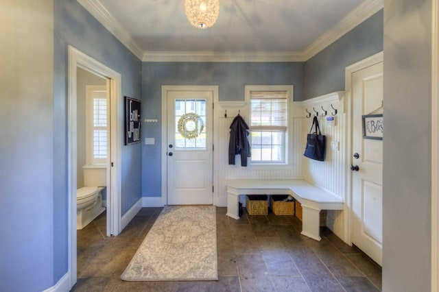 mudroom featuring baseboards and ornamental molding