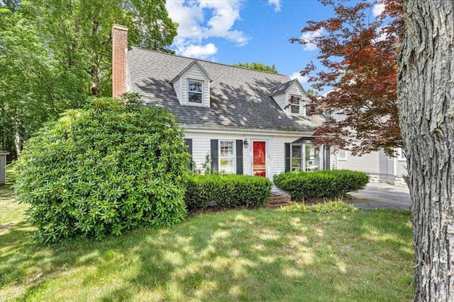 440 Broadway, North Attleboro, MA 02760 - cape cod house featuring a chimney, a front lawn, and a shingled roof