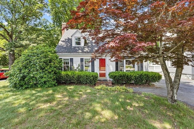 440 Broadway, North Attleboro, MA 02760 - view of front of home with a front lawn and a chimney