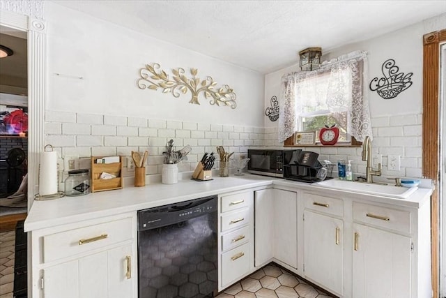 440 Broadway, North Attleboro, MA 02760 - kitchen with black appliances, backsplash, light countertops, and light tile patterned flooring