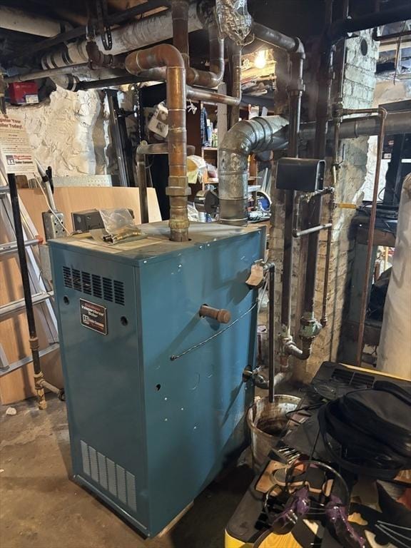 20 Osgood Ave, Lowell, MA 01850 - utility room featuring a heating unit