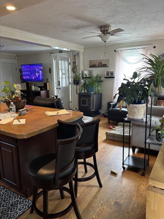 20 Osgood Ave, Lowell, MA 01850 - bar with light wood-style floors, healthy amount of natural light, ceiling fan, crown molding, and recessed lighting