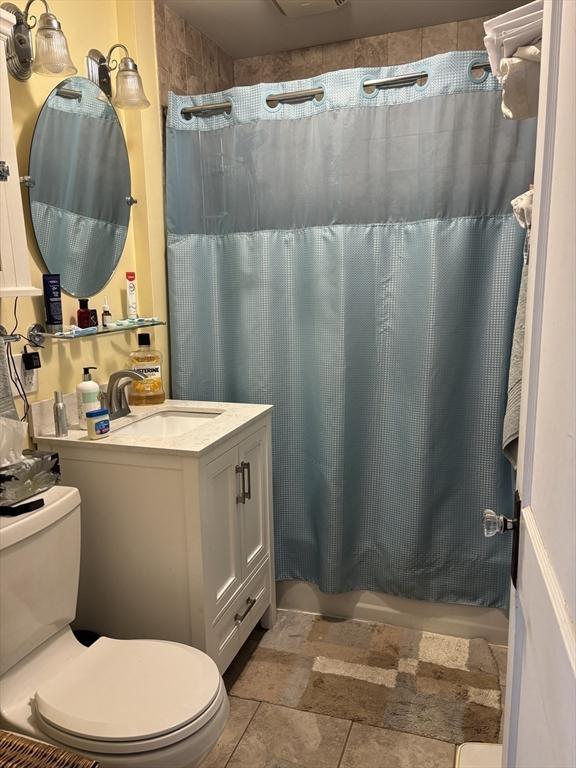 20 Osgood Ave, Lowell, MA 01850 - full bathroom featuring vanity and shower / bathtub combination with curtain