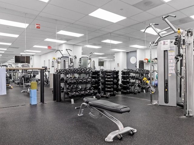 workout area with a drop ceiling