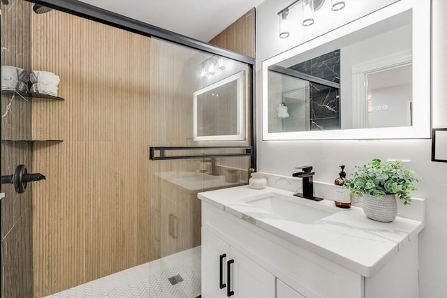 bathroom with vanity and walk in shower