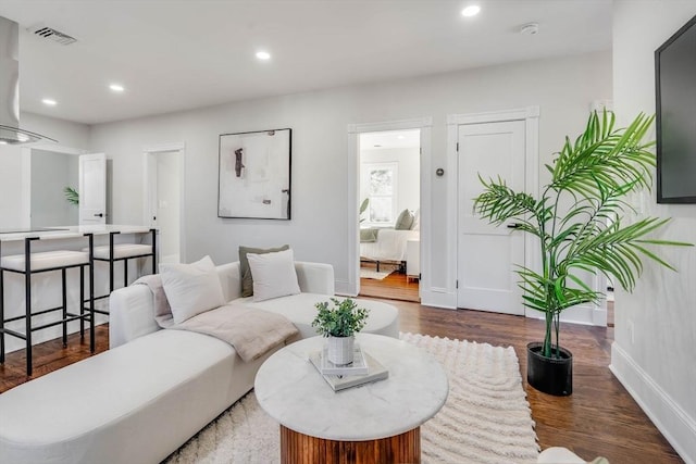 living room with dark wood-type flooring