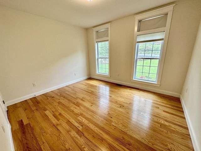 14 Pine Knoll Rd, Lexington, MA 02420 - empty room featuring light wood-type flooring and baseboards