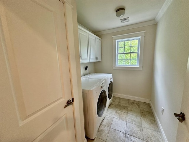 14 Pine Knoll Rd, Lexington, MA 02420 - clothes washing area with washer and clothes dryer, baseboards, cabinet space, ornamental molding, and light stone finish flooring