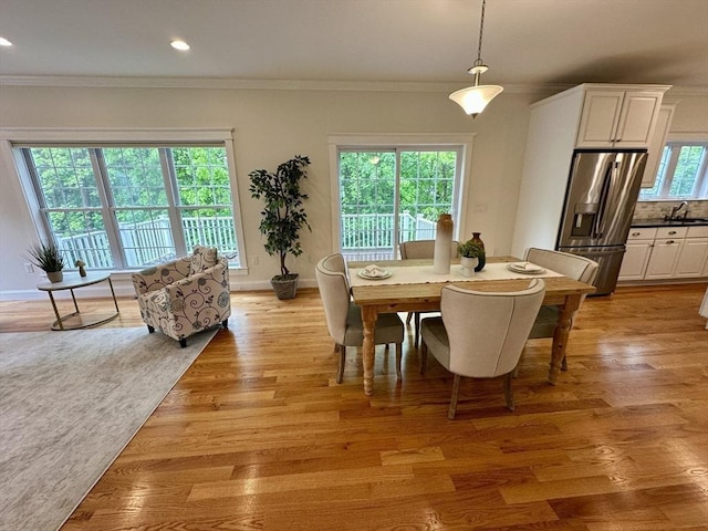 14 Pine Knoll Rd, Lexington, MA 02420 - dining area with ornamental molding, light wood finished floors, recessed lighting, and baseboards