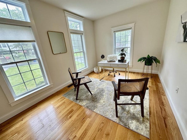 14 Pine Knoll Rd, Lexington, MA 02420 - home office with plenty of natural light, wood finished floors, and baseboards