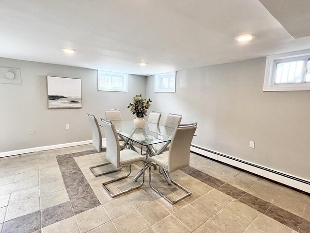 dining area featuring recessed lighting, baseboards, and a baseboard heating unit