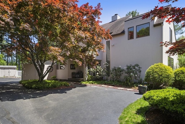 17 Juniper Ln, Framingham, MA 01701 - view of front of property with a chimney