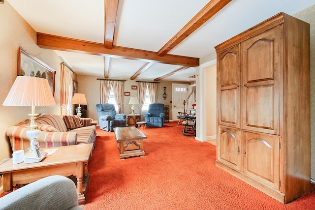 living room with light carpet, stairs, and beam ceiling